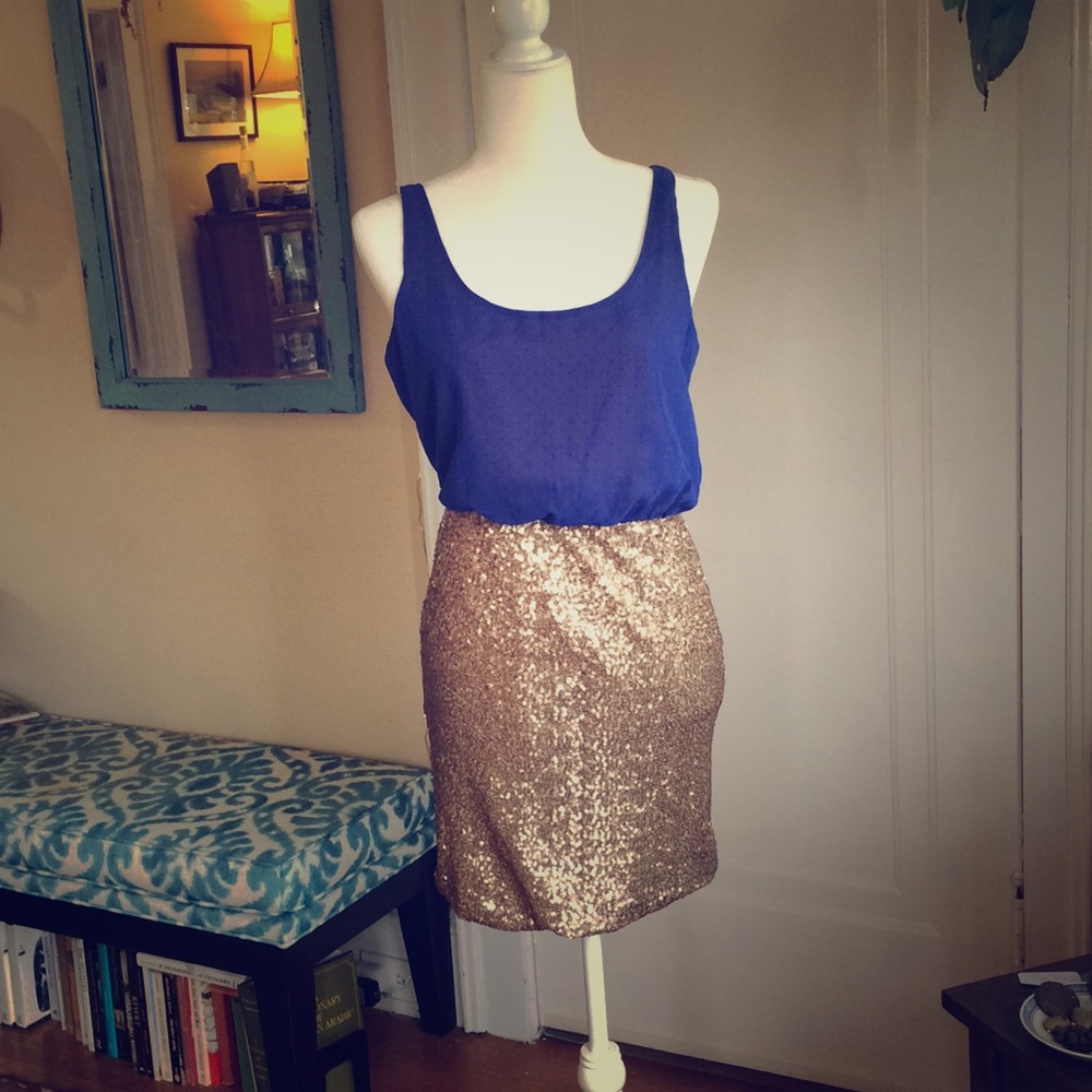 Blue and gold open back blouson wiggle dress.